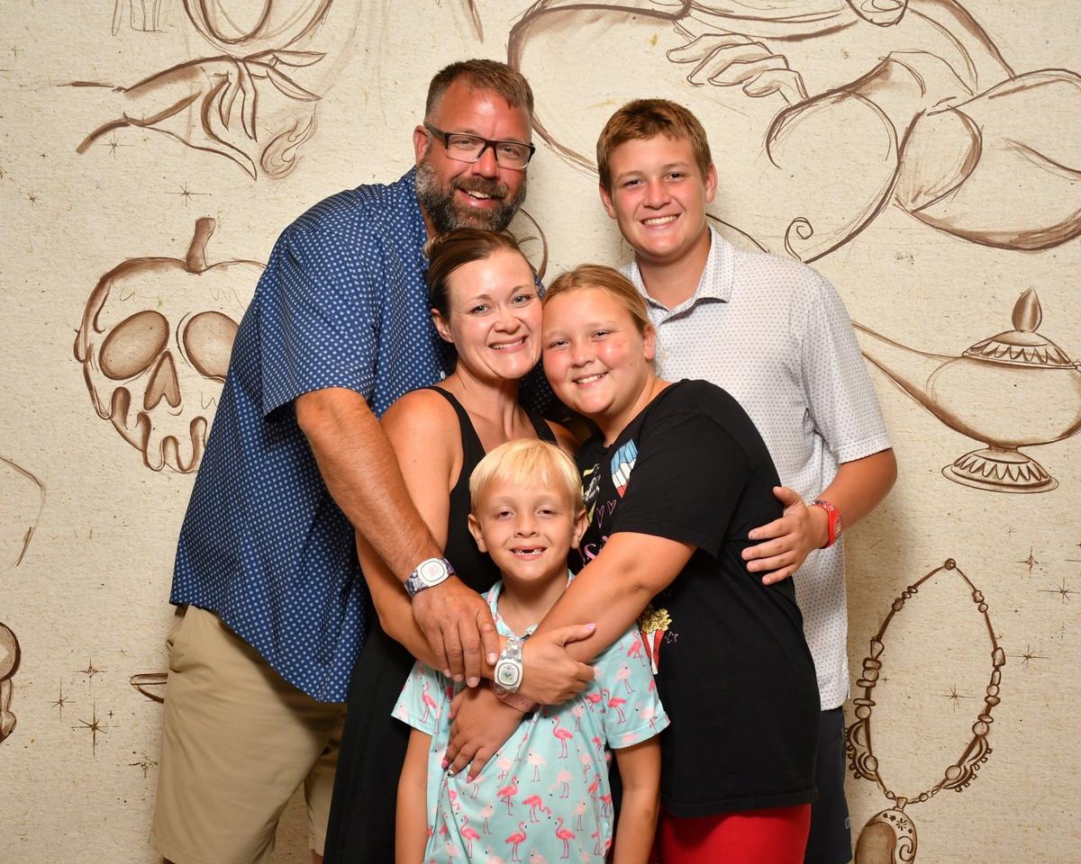 Danelle Farmer with her husband Justin and their three children.